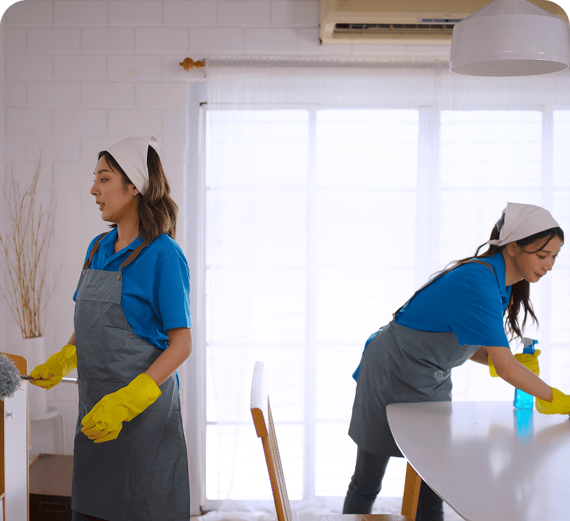 Cleaning staff working in a modern kitchen