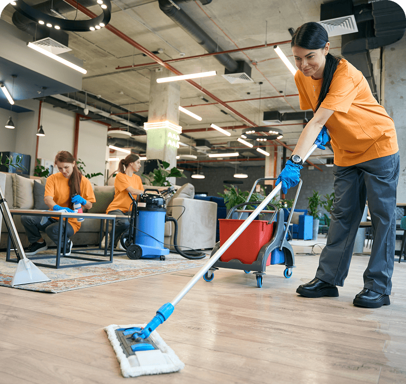 Cleaning crew working in modern office