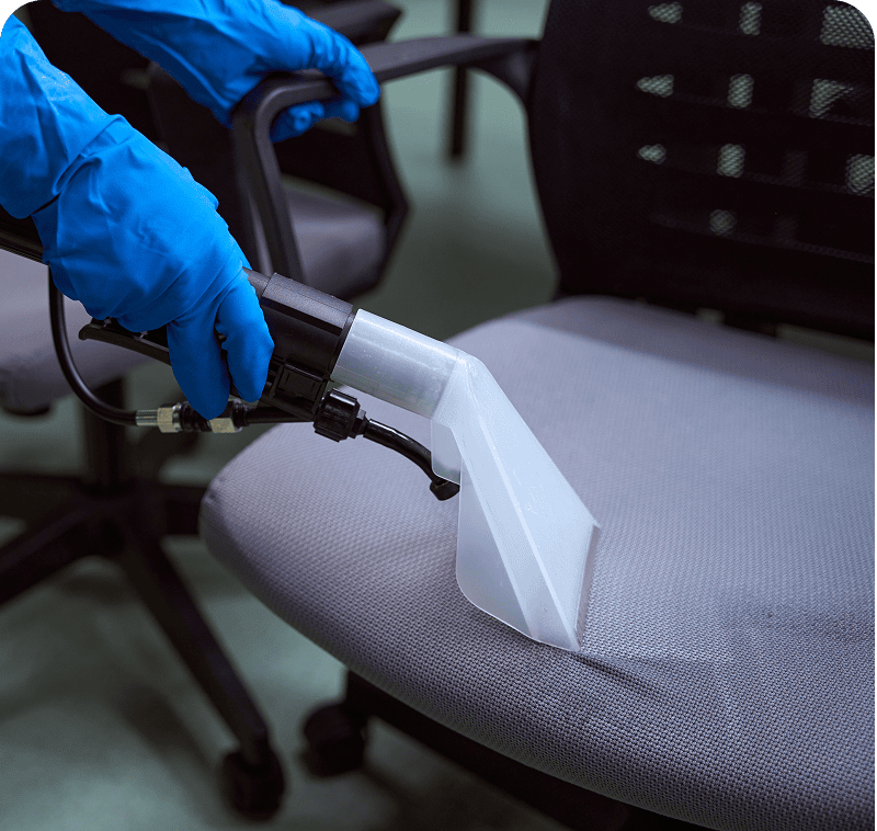 Vacuum cleaning office chair upholstery